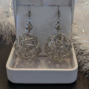 Silver hollow ball wire earrings